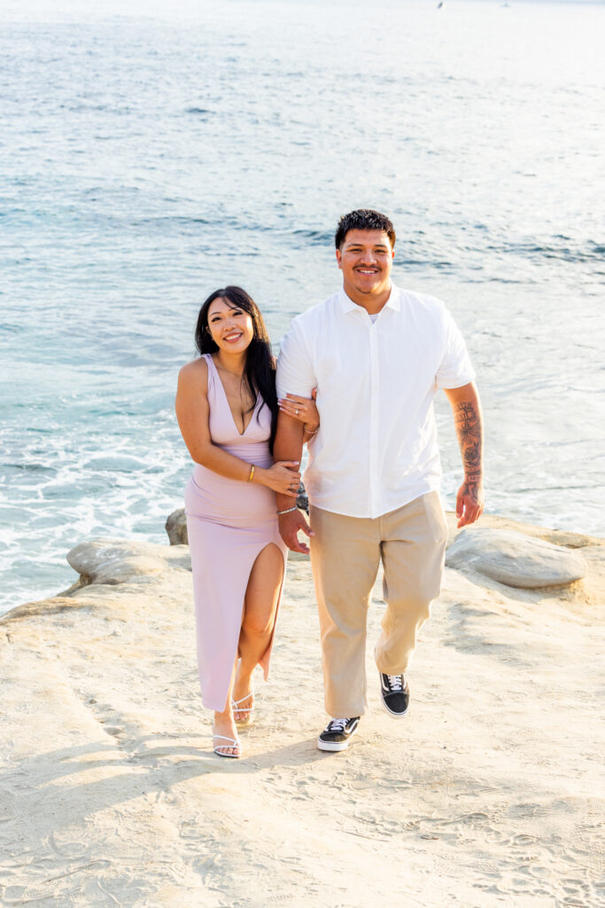 A Low-Key La Jolla Proposal with 50 Red Roses and Family Waiting Nearby san diego beach photographer 5